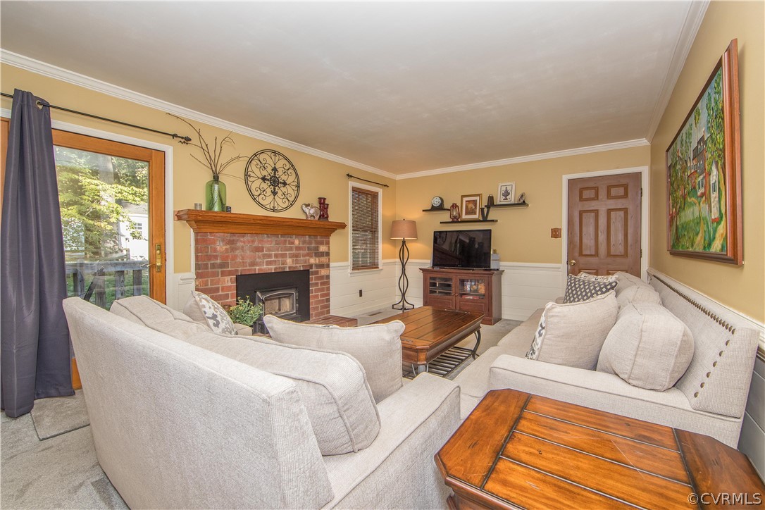 807 Dawnwood Road Midlothian, VA 23114 - Photo 7 of 37 a living room with furniture and a fireplace
