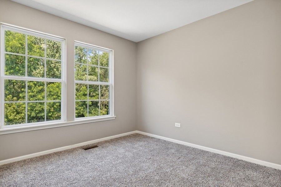 2415 Fen View Circle Island Lake, IL 60042 - Photo 16 of 27 an empty room with a window