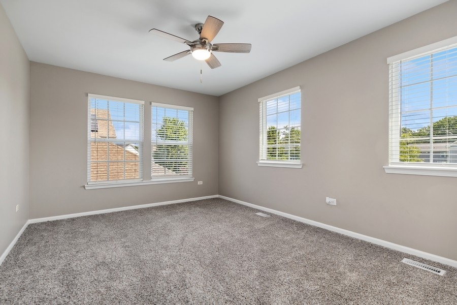 2415 Fen View Circle Island Lake, IL 60042 - Photo 17 of 27 a view of an empty room with a window