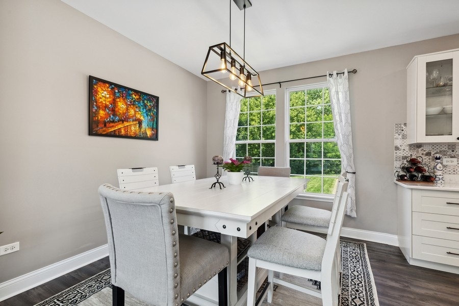 2415 Fen View Circle Island Lake, IL 60042 - Photo 3 of 27 a view of a dining room with furniture window and outside view