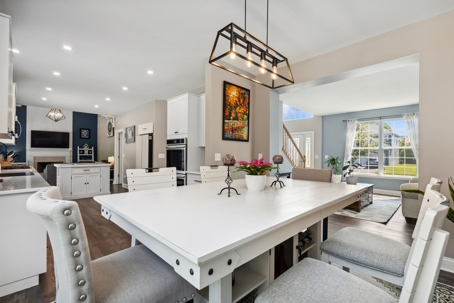 2415 Fen View Circle Island Lake, IL 60042 - Photo 4 of 27 a view of kitchen dining table and chairs