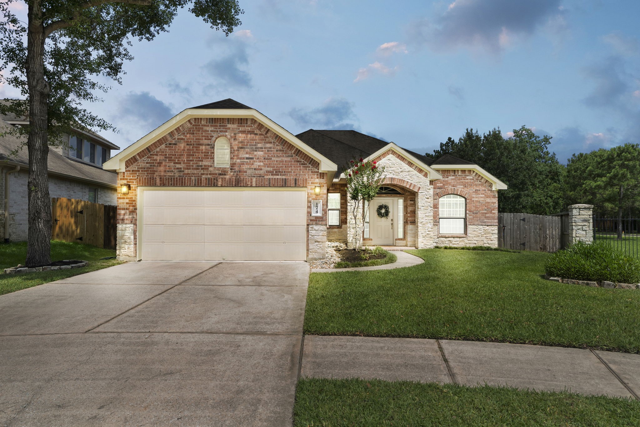 Charming brick and stone exterior on this DR Horton one-story, nestled on a spacious lot with great curb appeal.