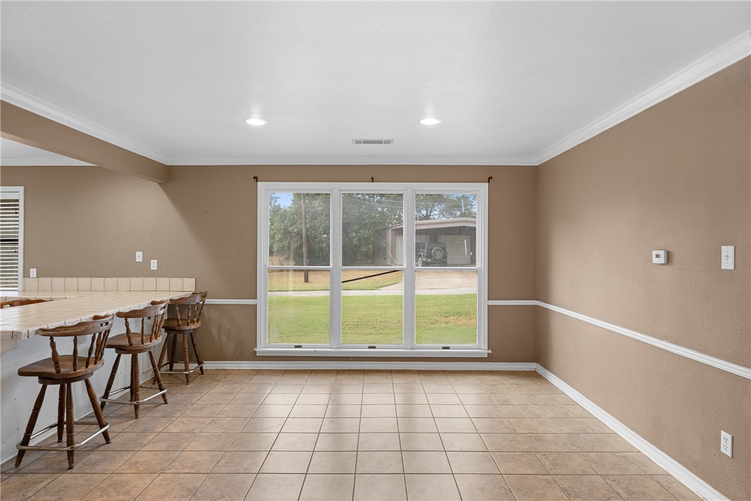 1027 Shadylane Drive Lexington, TX 78947 - Photo 13 of 45 a view of an empty room with a window