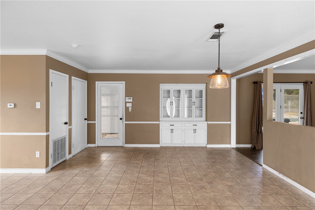 1027 Shadylane Drive Lexington, TX 78947 - Photo 14 of 45 a view of a room with cabinet and windows