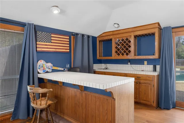 a utility room with stainless steel appliances