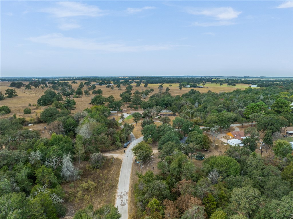 1027 Shadylane Drive Lexington, TX 78947 - Photo 36 of 45 an aerial view of a city and mountain