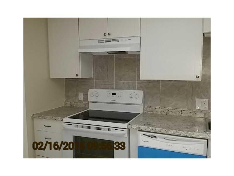 2651 South Course Drive, Unit 101 Pompano Beach, FL 33069 - Photo 2 of 12 Kitchen