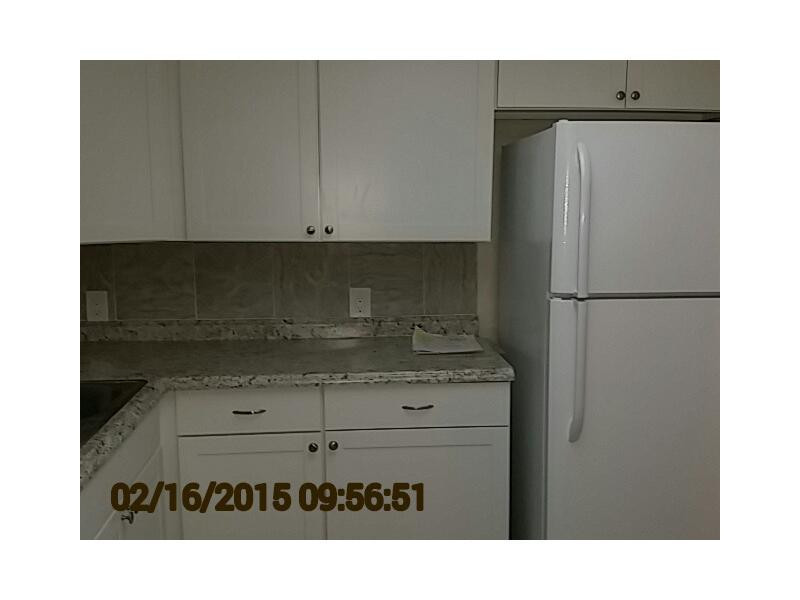 2651 South Course Drive, Unit 101 Pompano Beach, FL 33069 - Photo 3 of 12 Kitchen