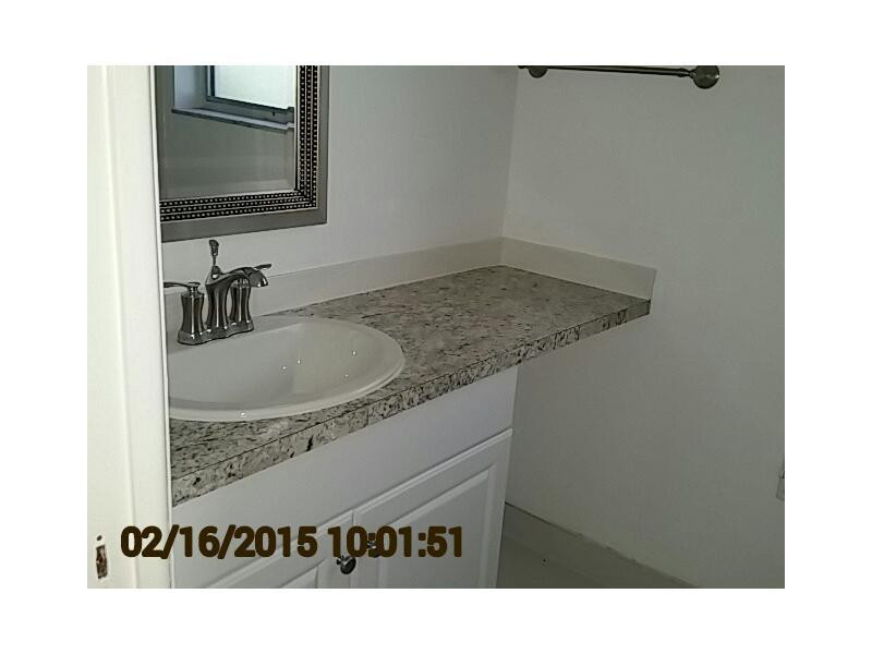 2651 South Course Drive, Unit 101 Pompano Beach, FL 33069 - Photo 7 of 12 Bathroom