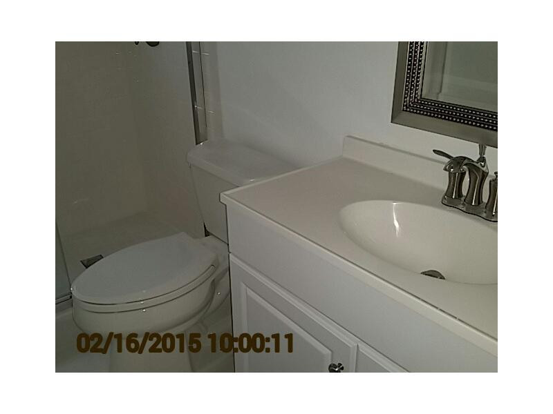 2651 South Course Drive, Unit 101 Pompano Beach, FL 33069 - Photo 10 of 12 Bathroom