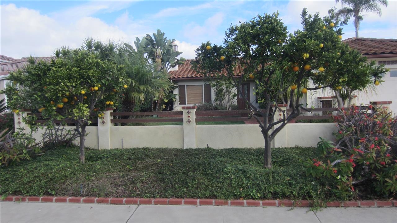 321 Trailview Road Encinitas, CA 92024 - Photo 4 of 25 Stucco wall with split rail fencing and rustic gate add charm and character.