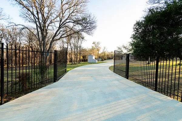 a front view of a house with swimming pool