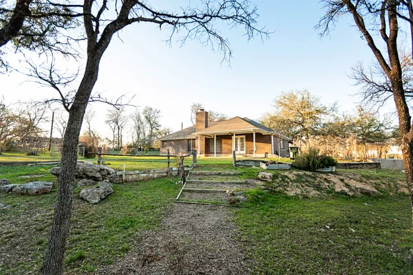a view of a room with wooden walls