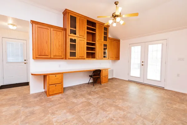 wooden floor in an empty room and a window