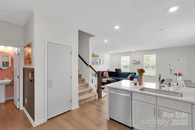 a view of living room with furniture and windows