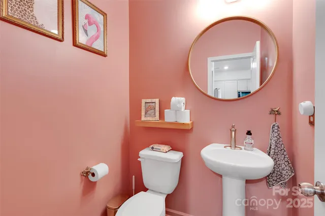 a bathroom with a toilet and a sink