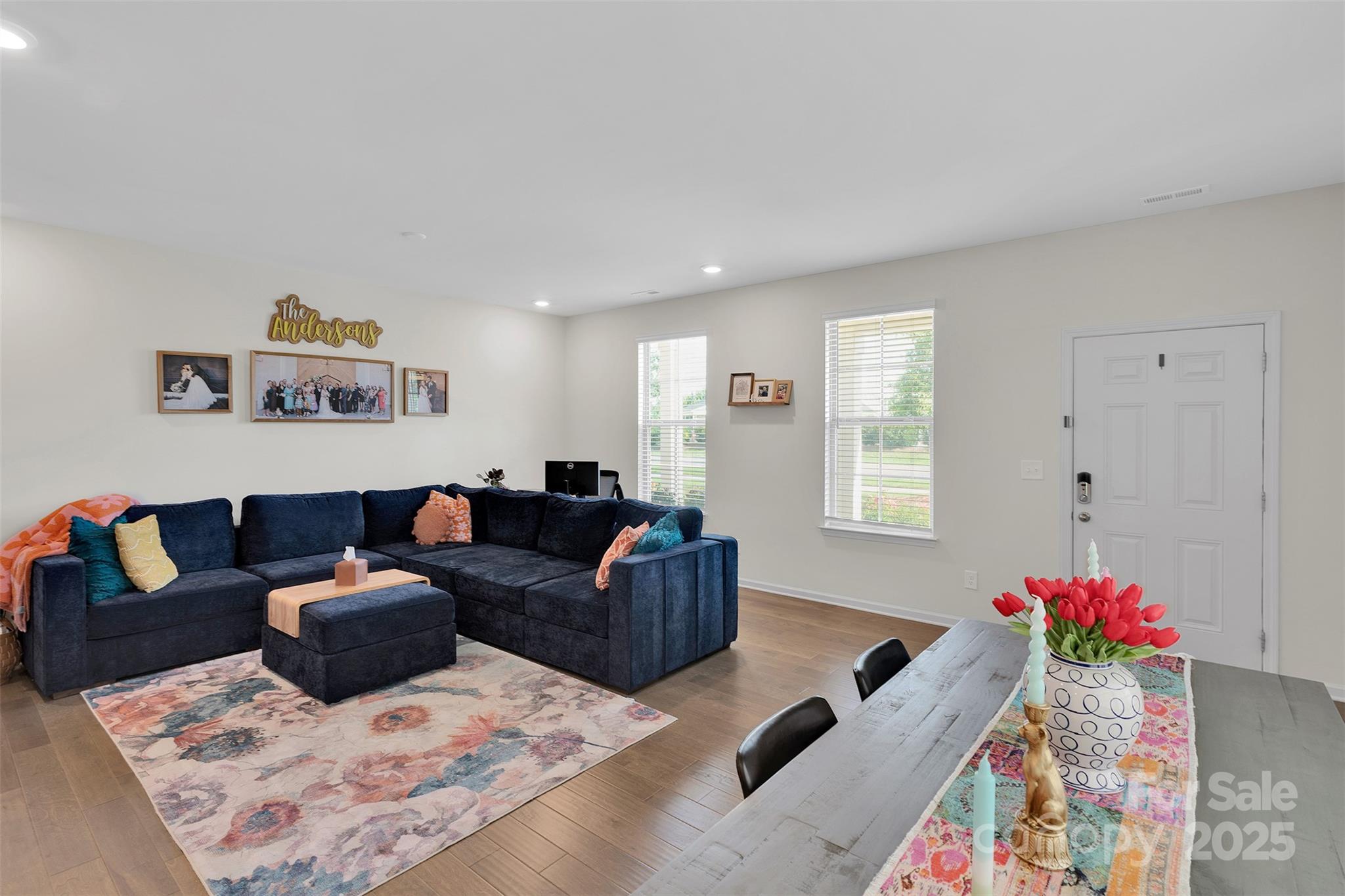 2131 Stevens Mill Road Matthews, NC 28104 - Photo 9 of 27 a living room with furniture and a couch
