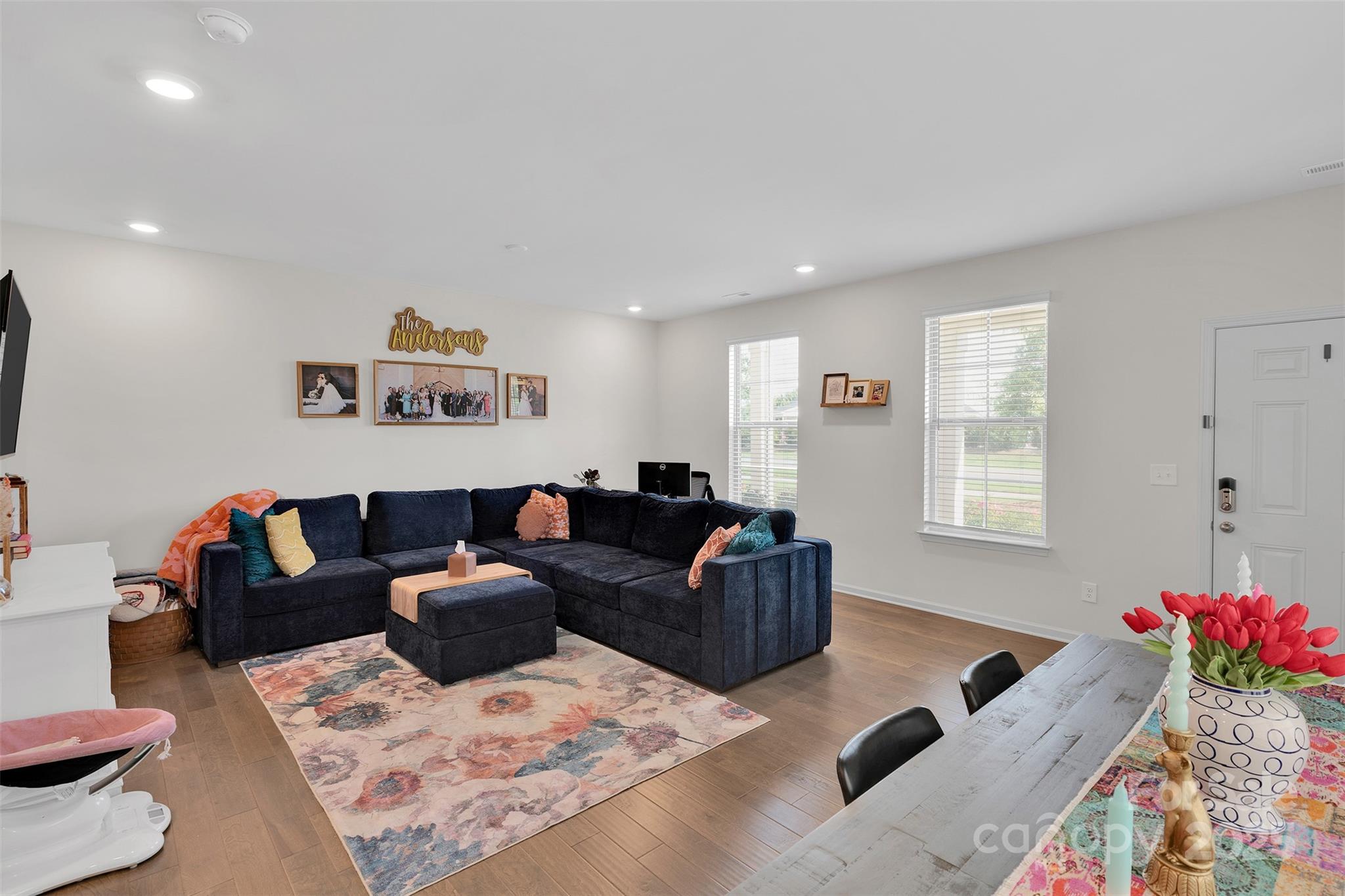 2131 Stevens Mill Road Matthews, NC 28104 - Photo 10 of 27 a living room with furniture and a couch