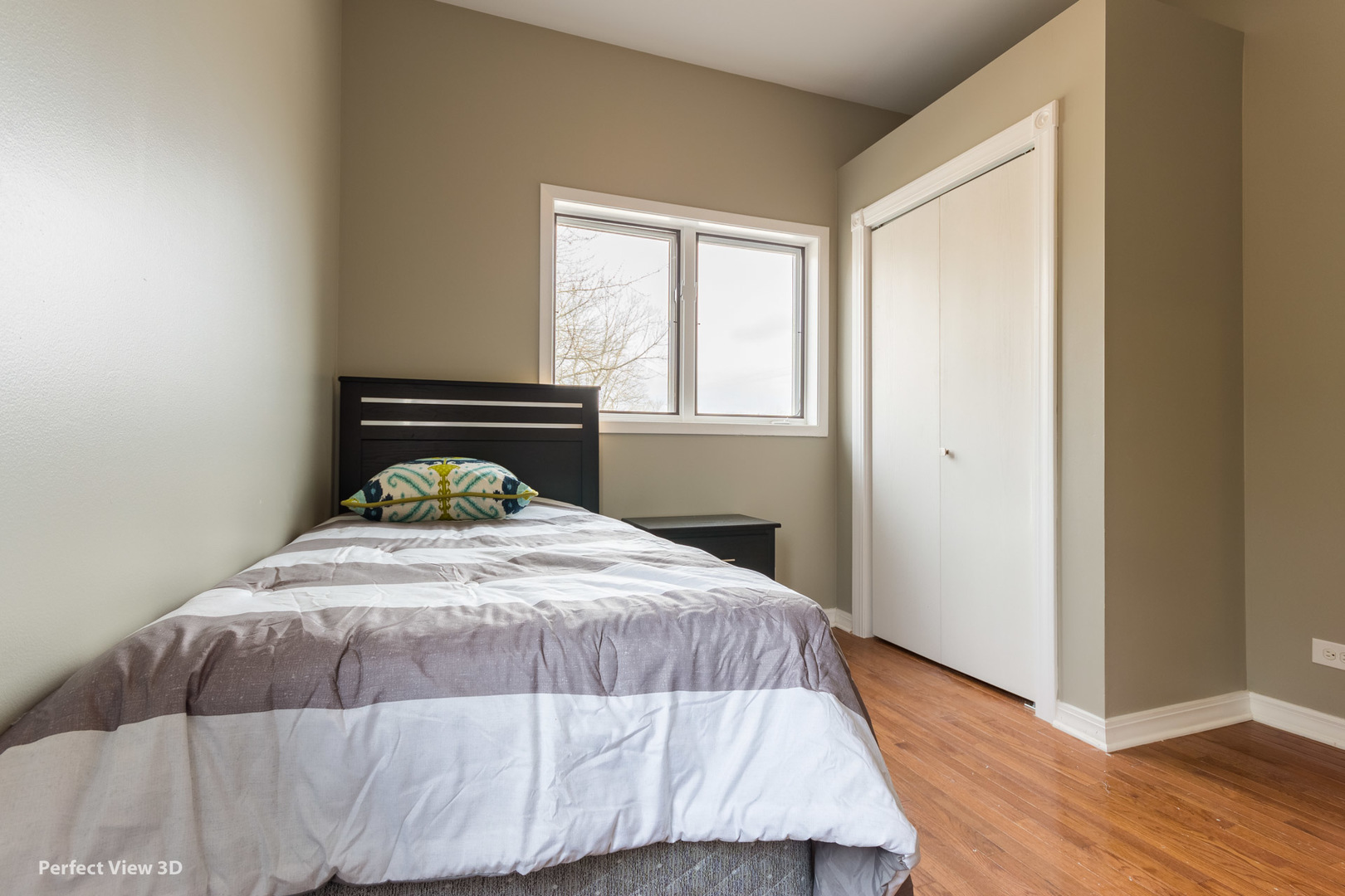 1100 West Seil Road Shorewood, IL 60404 - Photo 18 of 30 a bedroom with a bed and wooden floor