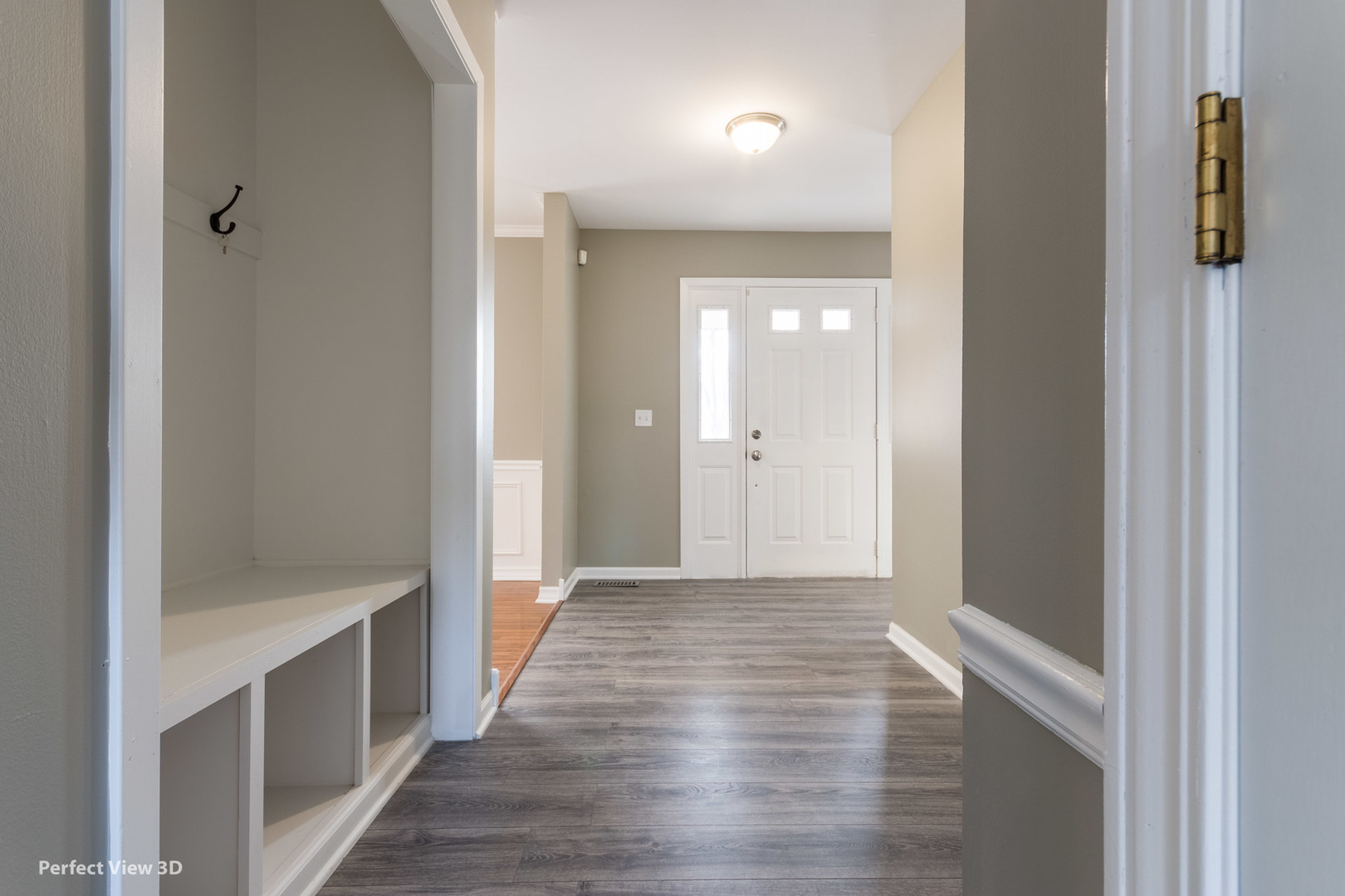 1100 West Seil Road Shorewood, IL 60404 - Photo 5 of 30 a view of a hallway with wooden floor