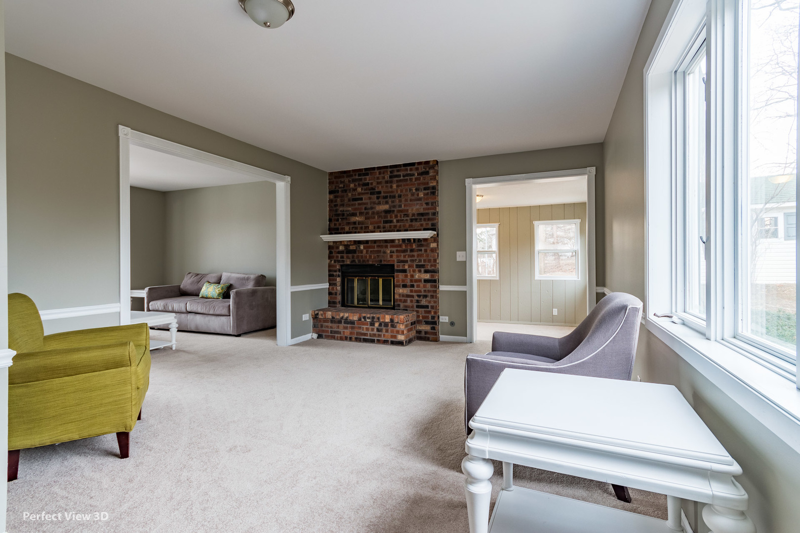 1100 West Seil Road Shorewood, IL 60404 - Photo 9 of 30 a living room with furniture and a fireplace