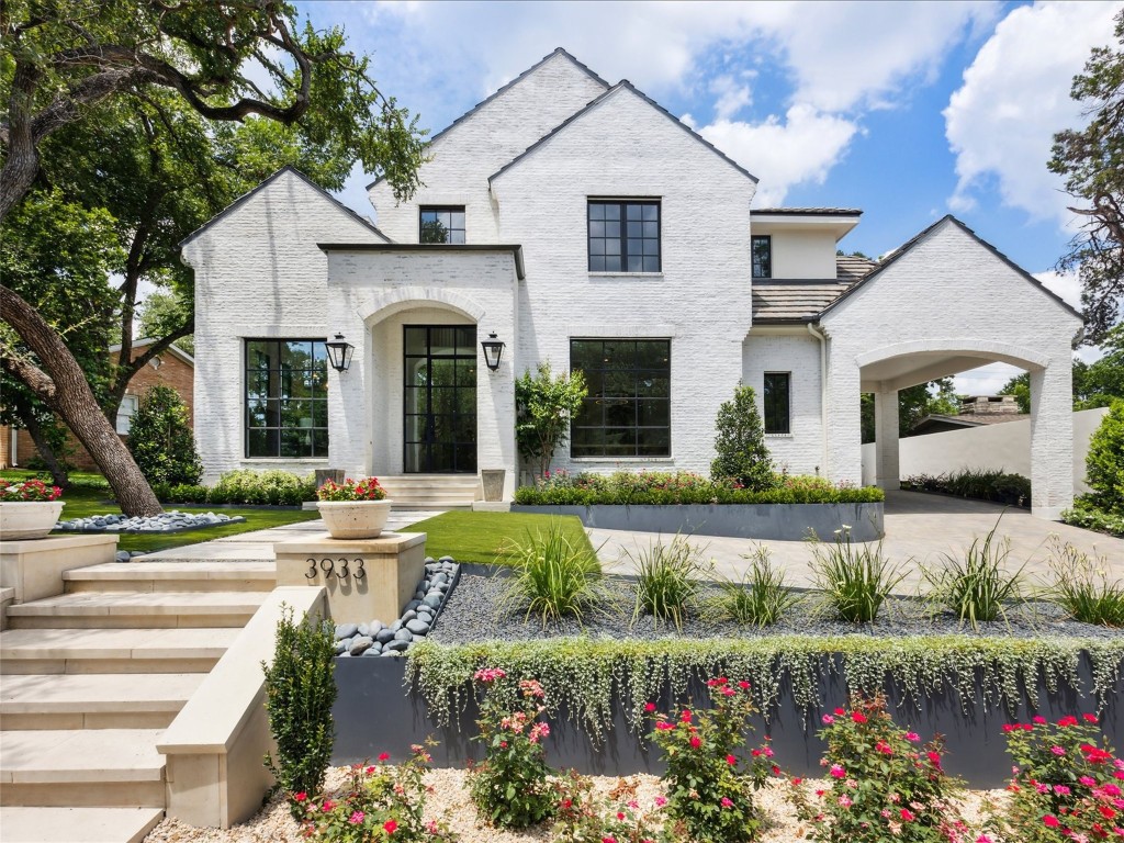 3933 Balcones Drive Austin, TX 78731 - Photo 1 of 1 a view of a white house with a big yard and potted plants