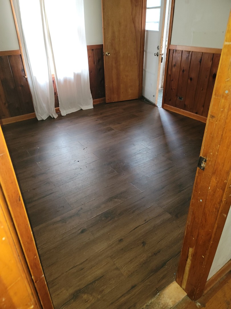 213 South Summit Street Wheaton, IL 60187 - Photo 13 of 33 a view of front door with wooden floor