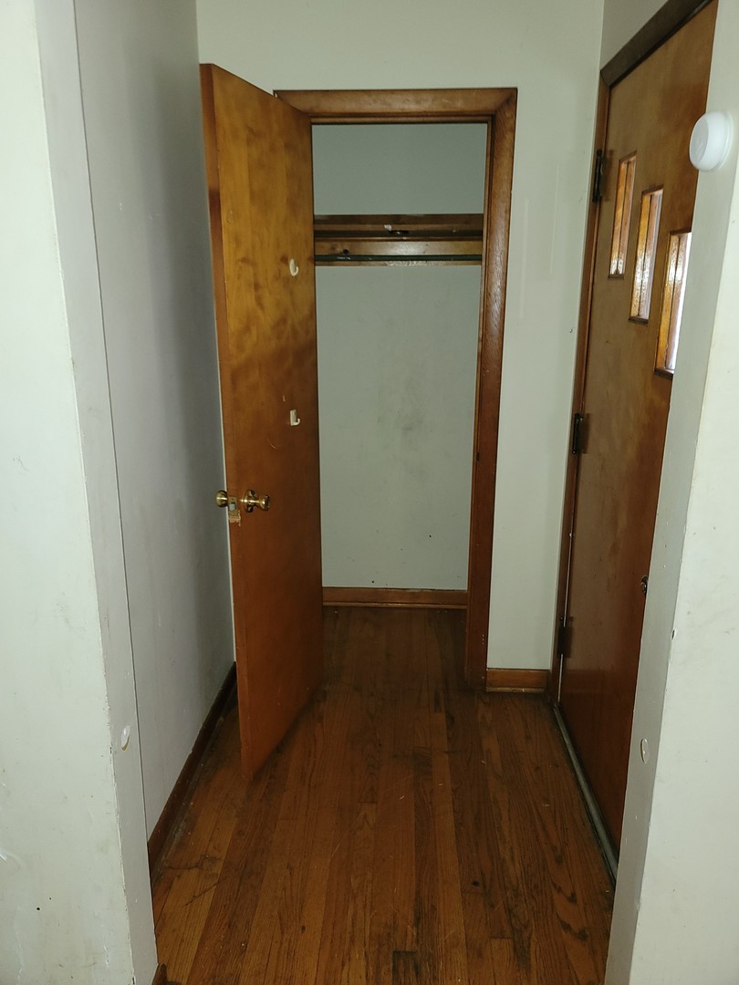 213 South Summit Street Wheaton, IL 60187 - Photo 30 of 33 a view of a hallway with wooden floor