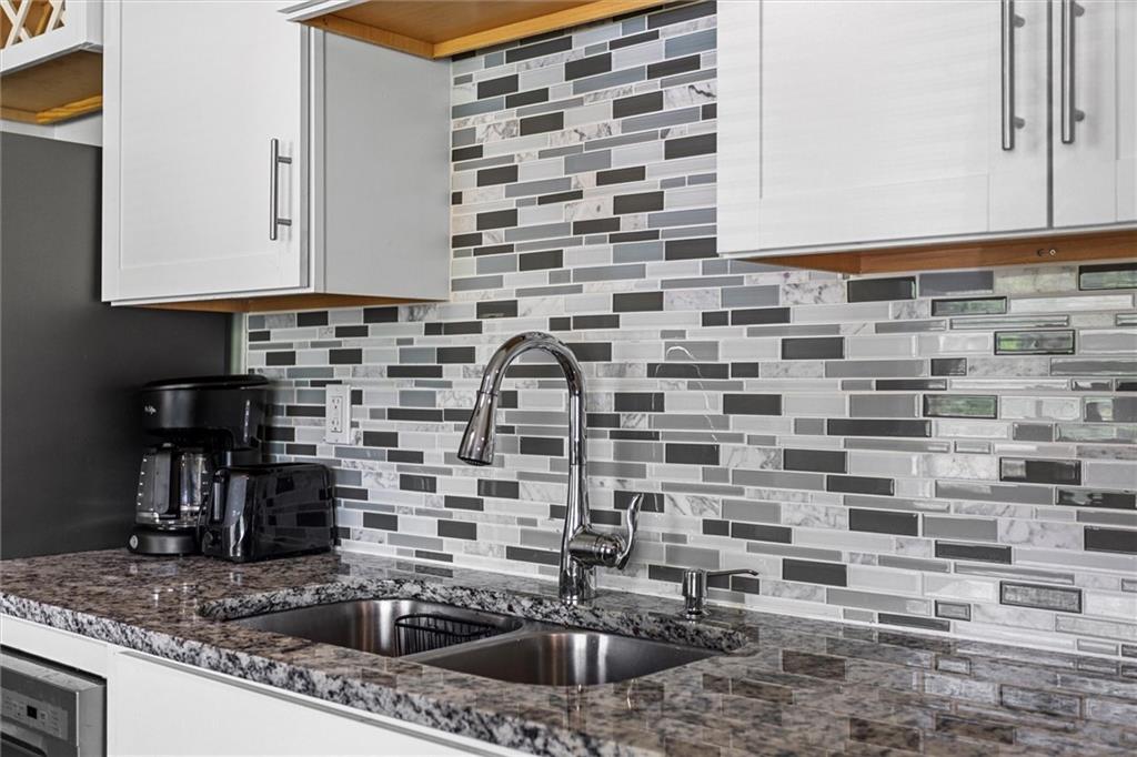 1111 Valley View Road Southeast Atlanta, GA 30315 - Photo 11 of 31 a kitchen with a sink and a stove