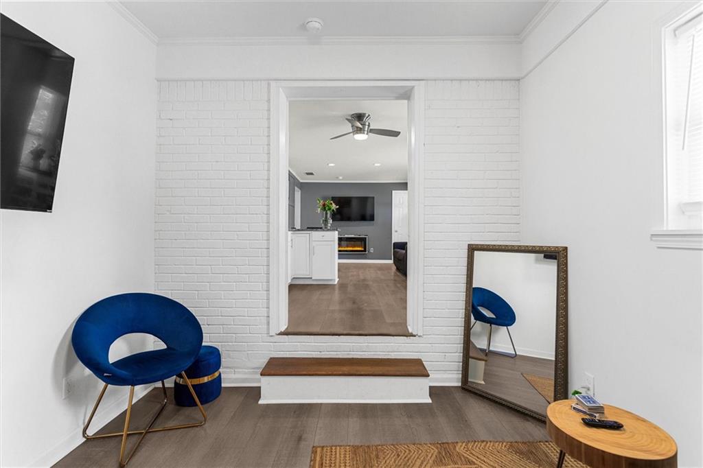 1111 Valley View Road Southeast Atlanta, GA 30315 - Photo 12 of 31 a living room with furniture and a rug