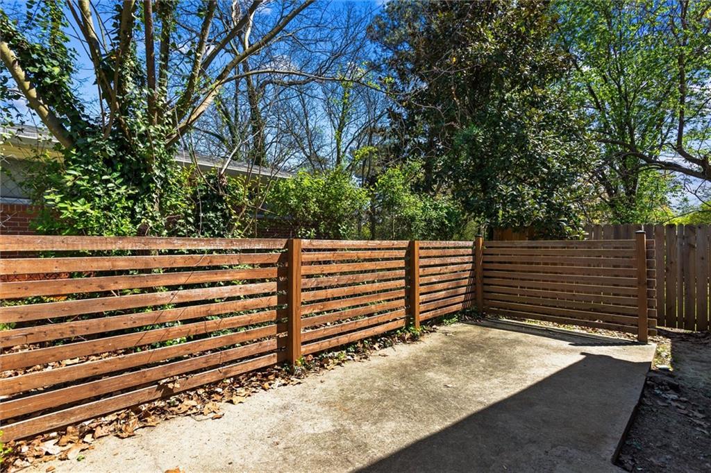 1111 Valley View Road Southeast Atlanta, GA 30315 - Photo 13 of 31 a view of a bench in a forest