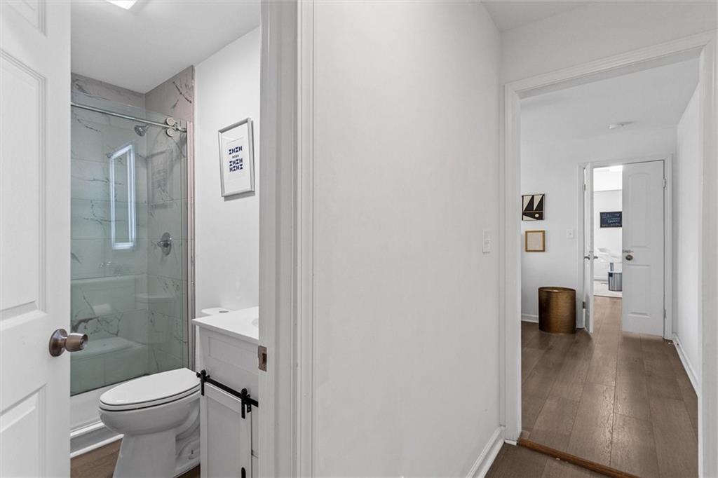 1111 Valley View Road Southeast Atlanta, GA 30315 - Photo 24 of 31 a bathroom with a sink and a toilet