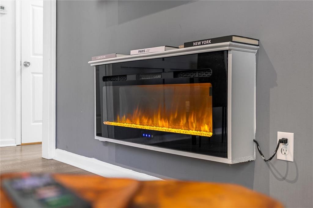 1111 Valley View Road Southeast Atlanta, GA 30315 - Photo 8 of 31 a view of room with wooden floor