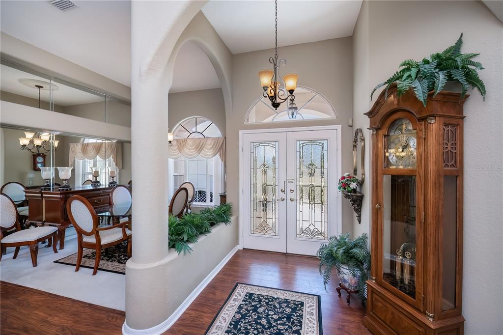 26373 Madagascar Road Punta Gorda, FL 33983 - Photo 12 of 90 a view of living room filled with furniture and a chandelier