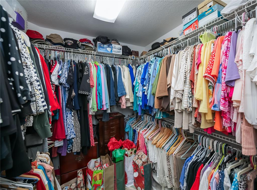 26373 Madagascar Road Punta Gorda, FL 33983 - Photo 42 of 90 a view of walk in closet with clothes