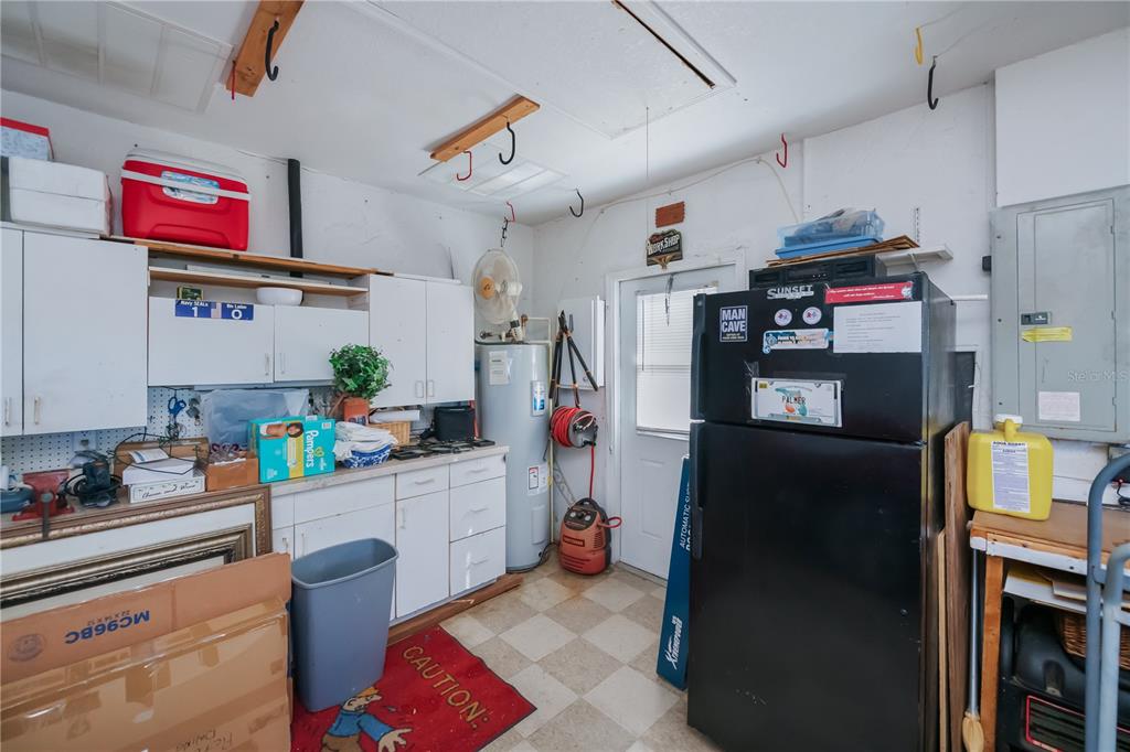 26373 Madagascar Road Punta Gorda, FL 33983 - Photo 79 of 90 a kitchen with stainless steel appliances granite countertop a refrigerator and a stove