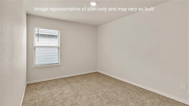 a view of a room that has a window in it