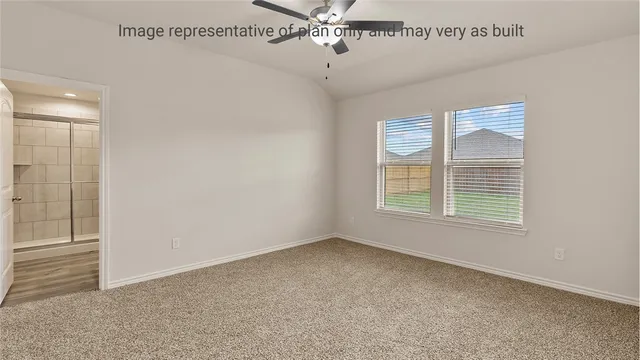 a bathroom with a granite countertop sink and shower