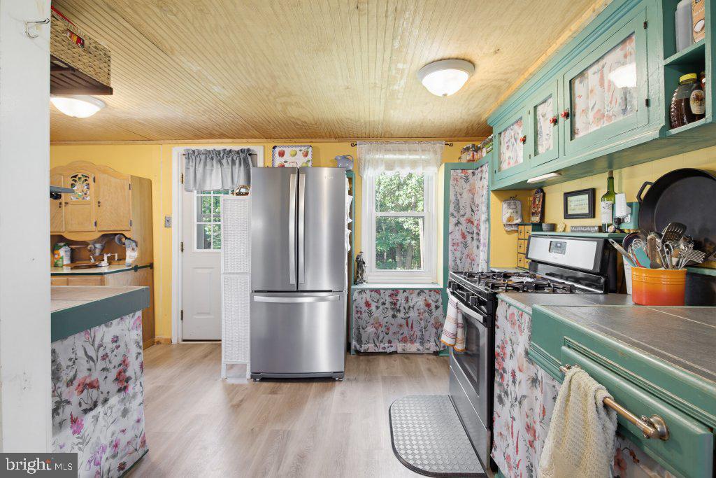 801 Old Commons Road Windsor, PA 17366 - Photo 12 of 43 Kitchen and door to outside patio area