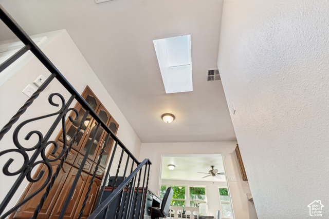 432 South 600 East Payson, UT 84651 - Photo 11 of 34 Ornate wrought iron railing, overhead skylight, recessed ceiling light, wood-finish built-in cabinetry, and ceiling fan