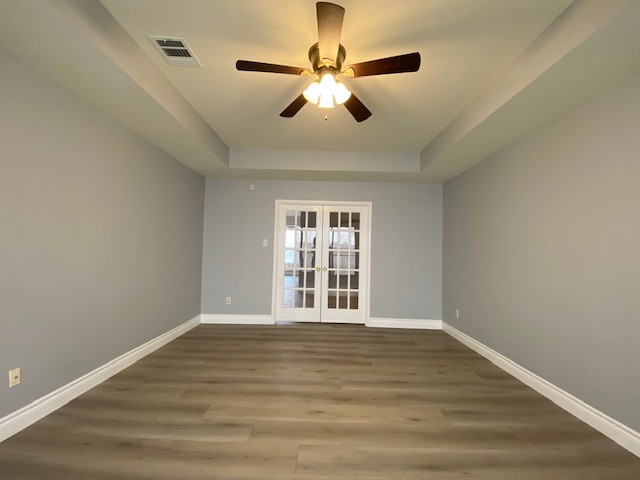 1512 Lorson Loop Round Rock, TX 78665 - Photo 10 of 29 a view of an empty room with wooden floor and a window