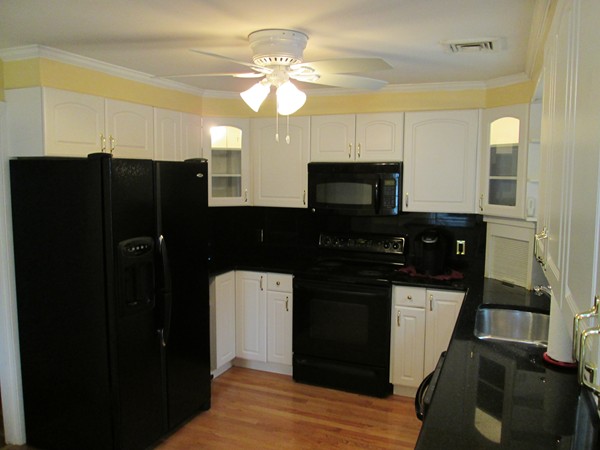 2 Wilfred Terrace Salem, MA 01970 - Photo 16 of 30 a kitchen with a sink and refrigerator