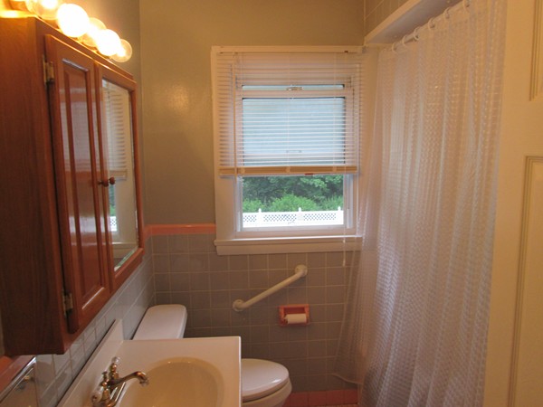 2 Wilfred Terrace Salem, MA 01970 - Photo 19 of 30 a bathroom with a toilet a sink and a shower