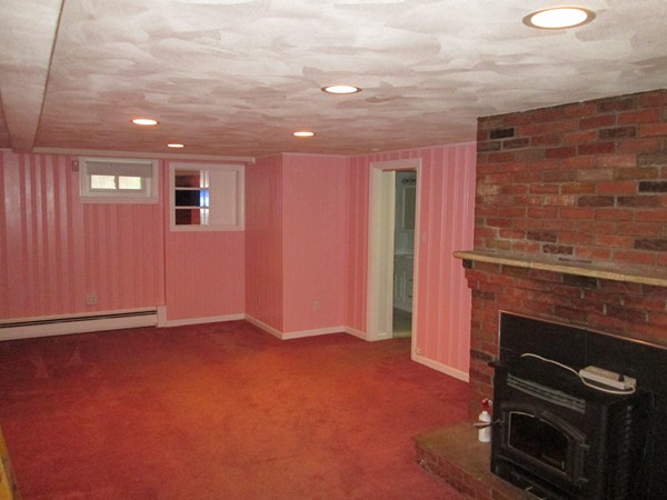 2 Wilfred Terrace Salem, MA 01970 - Photo 25 of 30 wooden floor in an empty room with a fireplace