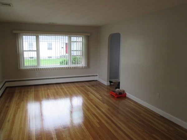 2 Wilfred Terrace Salem, MA 01970 - Photo 9 of 30 an empty room with wooden floor and a window