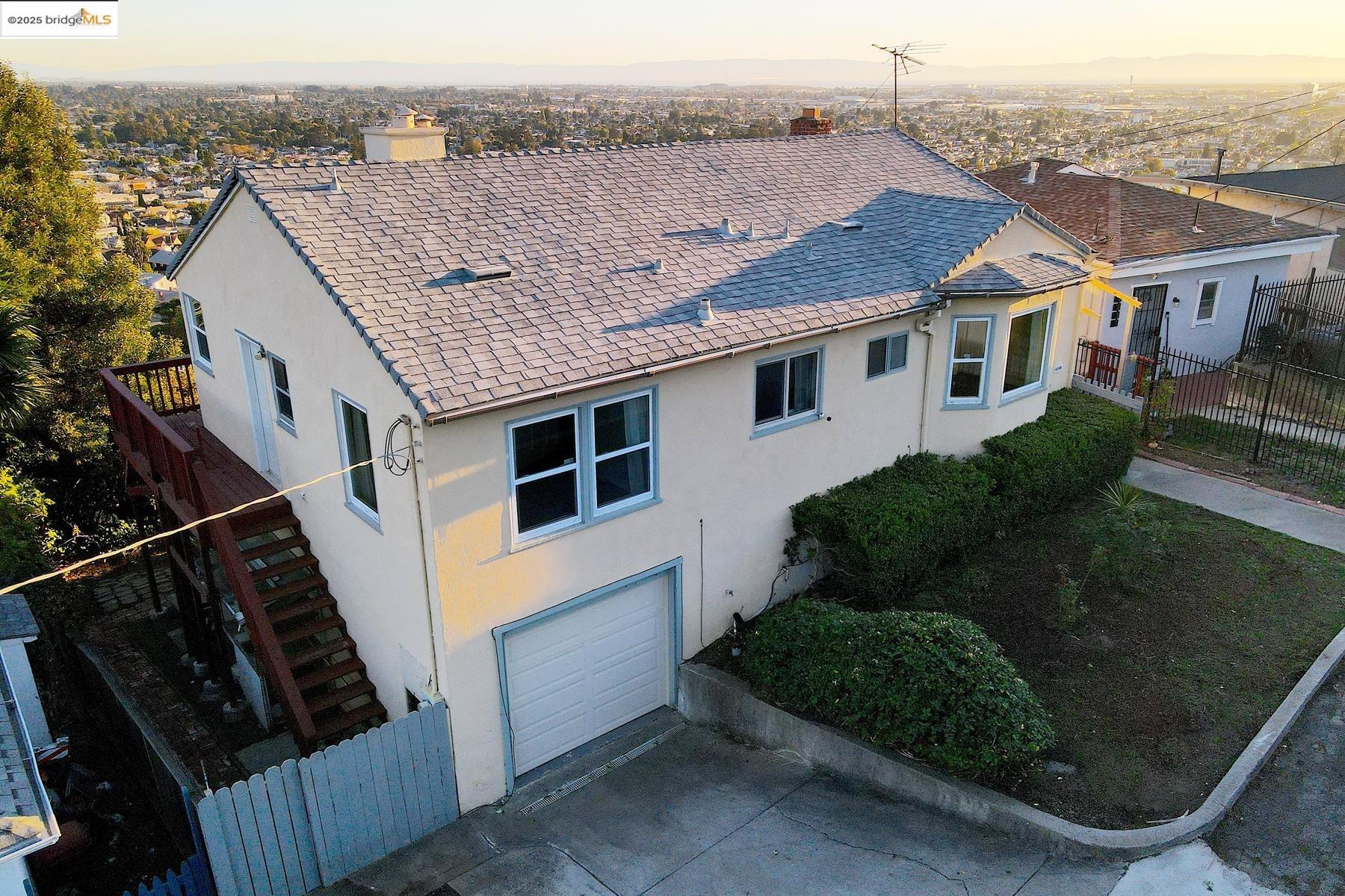 a aerial view of a house with a yard