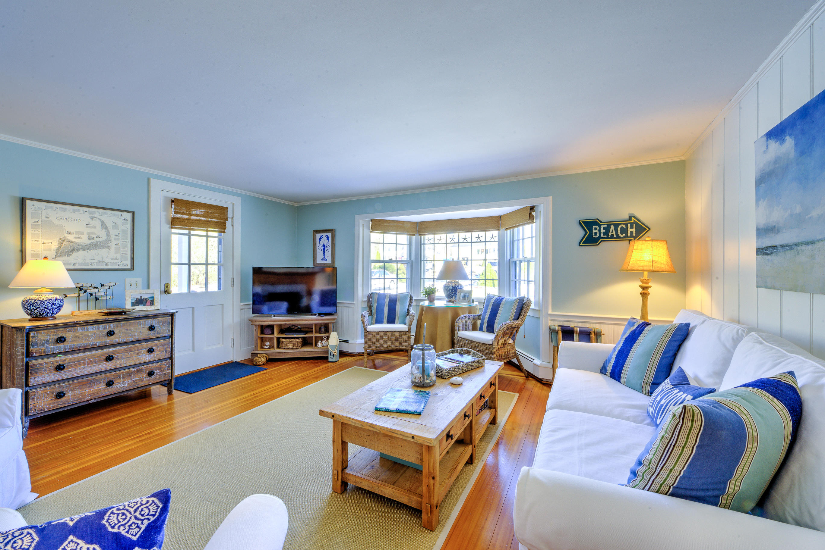 36 Deep Hole Road Harwich Port, MA 02646 - Photo 18 of 34 a living room with furniture and a flat screen tv
