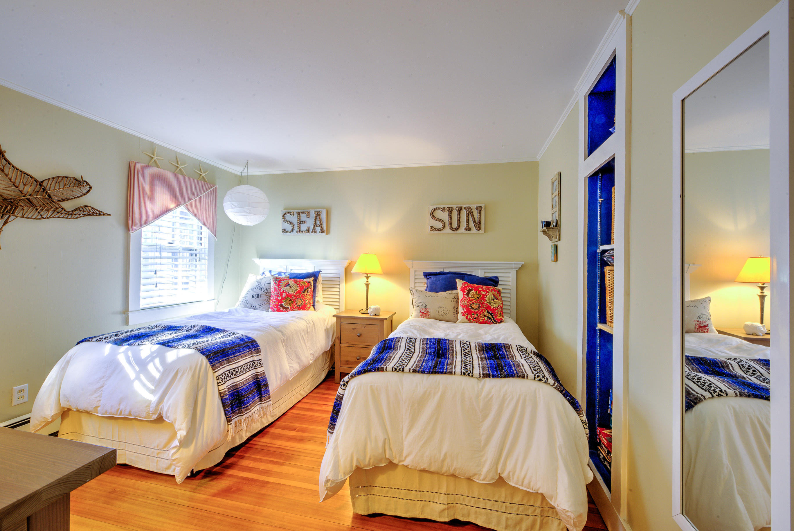 36 Deep Hole Road Harwich Port, MA 02646 - Photo 28 of 34 a bedroom with a bed and a painting on the wall