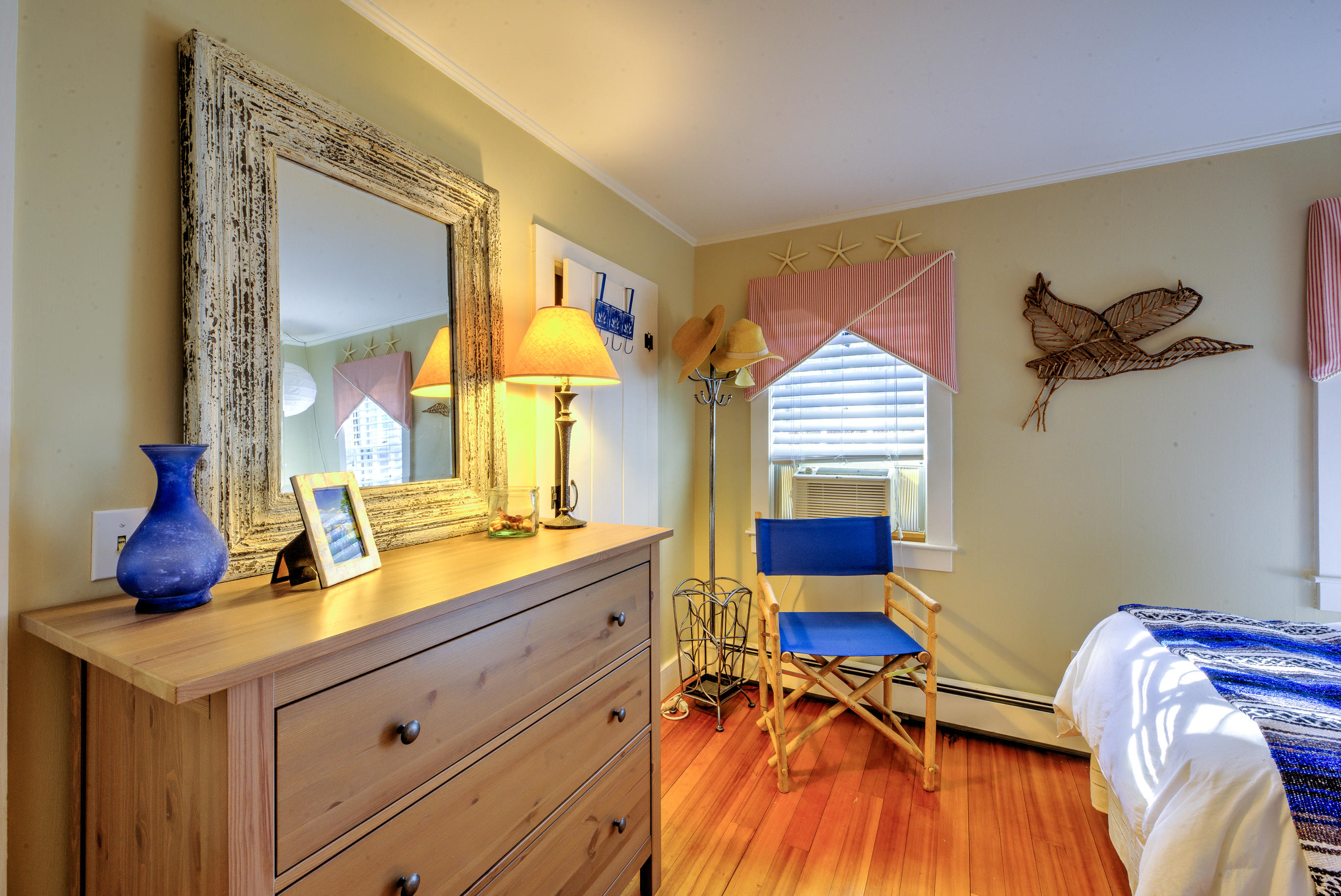 36 Deep Hole Road Harwich Port, MA 02646 - Photo 29 of 34 a bedroom with a bed and a dresser