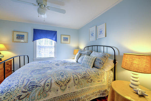 36 Deep Hole Road Harwich Port, MA 02646 - Photo 33 of 34 a bedroom with a bed and a window